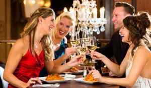 Restaurant diners with wine glasses