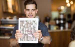 Waiter holding iPad restaurant app